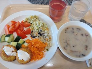 Salad, rolls with spread, mushroom soup, birch sap drink. at Kasvisravintola Karpalo in Kuusamo