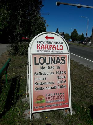 Sign by the road. at Kasvisravintola Karpalo in Kuusamo