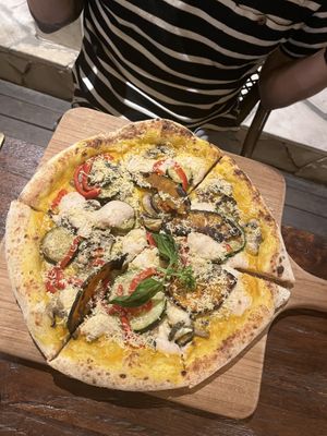 Pizza with zucchini, eggplant etc, homemade vegan cheese (amazing!!)   at Plant Bistro in Ubud