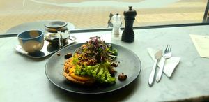 Sourdough with pumpkin-white beans créme, sage, chestnut champignons, pits and seeds at Foelie in Antwerpen