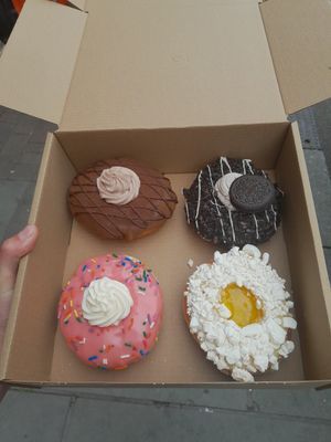 Clockwise: Triple Chocolate, Oreo, Lemon Meringue, and The Homer at Golden Glaze Dougnuts  in Worcester
