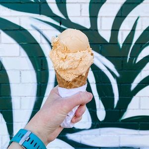 Creamsicle ice cream in fresh rolled waffle cone at Fairly Frosted in Hamilton