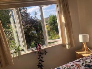 Garden view. Bring the table round and a lovely place to sit with a cup of tea, morning and evening. at Kettering B&B in Kettering