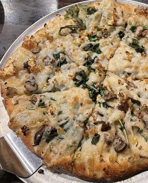 Wild mushroom and arugula pizza with vegan cheese (another personal fave).   at Pizza Luce - Lyndale Ave in Minneapolis