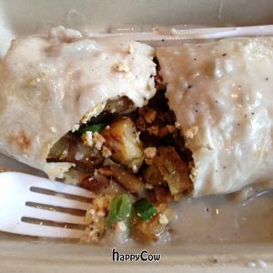 blue plate special! potatoes, scrambled tofu, 'sausage', peppers and country gravy! at Mead's Green Door Cafe in Orange