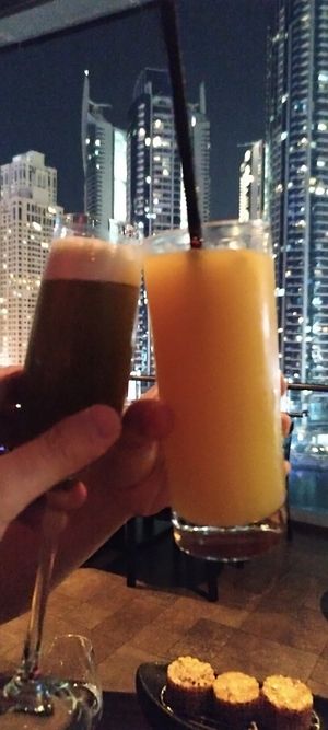 Zumo naranja y mocktail de frutas con sipore vainilla y te at Asia Asia - Dubai Marina in Dubai