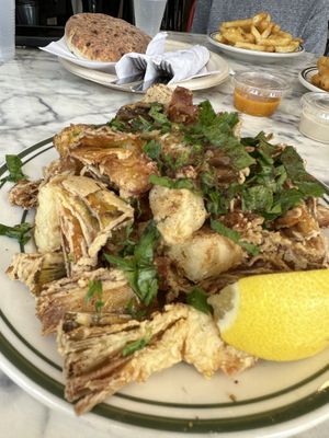 Fried artichoke - special (Ask to hold the mayo sauce. They gave us 3 other vegan sauces instead!)  at Chutzpah Kitchen  in Westfield