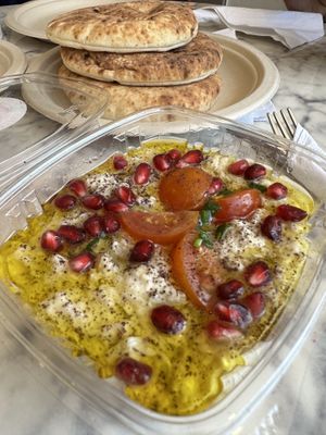 Babaganoush with cherry tomatoes and pomegranate seeds (served with pita)  at Chutzpah Kitchen  in Westfield