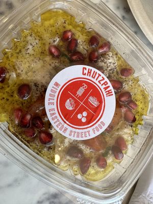 Babaganoush with cherry tomatoes and pomegranate seeds  at Chutzpah Kitchen  in Westfield