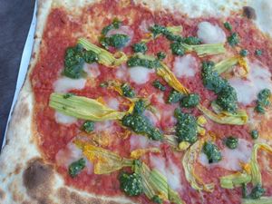 Pizza 'Veghu' with pesto, zucchini flowers and cheese by Veghu. at Les Arenes in Alghero
