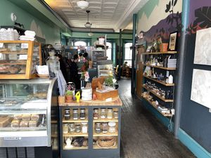 Seating & bathroom in the back  at Superfresh Organic Cafe in Brattleboro