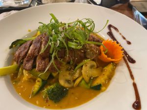 Yellow curry with seitan  at Vevi Restaurant III in Vienna