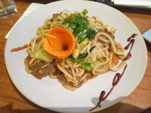 Udon noodles with pea protein bits and vegetables at Vevi Restaurant III in Vienna