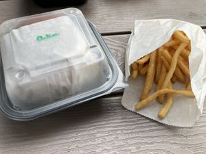 Takeout burger & fries  at Dada's Plant-Based Burgers & Breakfast in Seattle