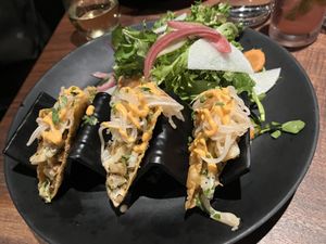 Vegan cauliflower tacos with wonton shell and siracha  at Dharma Bums in New Hope