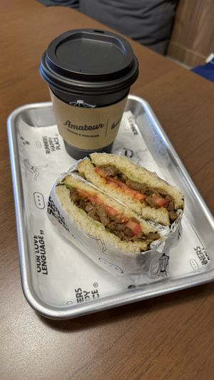 Latte + anticuchero  at Amateur Coffee & Run Club in Lima