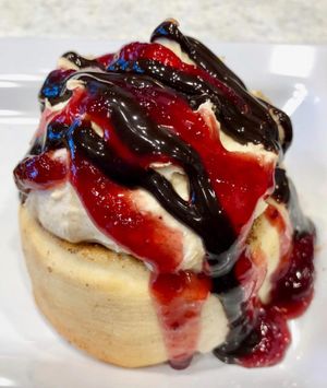 Peanut Butter Frosting, Strawberry Jam & Chocolate Sauce!  at Cinnaholic - Longview Common in Calgary