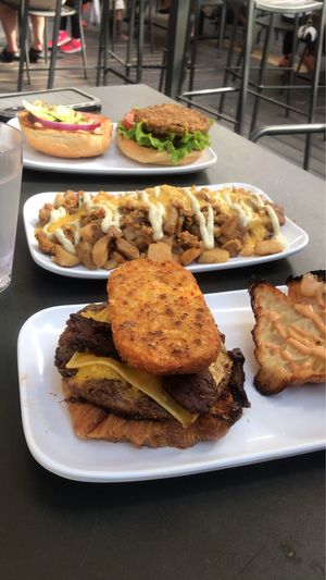 B.A.D. Burger, loaded breakfast potatoes, and the GBK burger at Green Bar and Kitchen in Fort Lauderdale