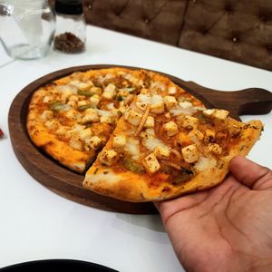 Tofu pizza vegan at V Go Nuts in Karnataka