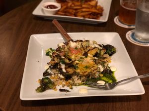 Vegan cauliflower steak special with couscous and brussels at Bauer's in Modesto