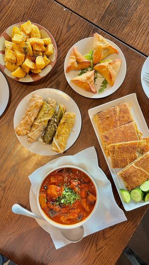 Clockwise from top left:
potatoes with kizbara; spinach fatayer; za'atar & olives borek; eggplant moussaka; cabbage rolls at Shamiat Authentic Syrian Restaurant in Northcote