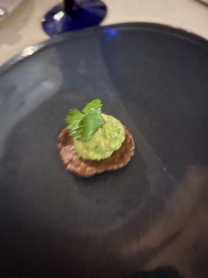 Amuse-buche (a cracker with guacamole?)  at LaFrida Restaurant in Cabo San Lucas