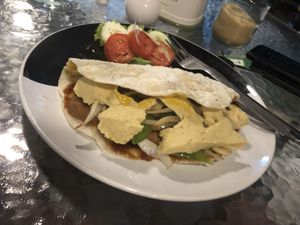 Flatbread with vegan sausage and cheese 😍 at Cha Chai Home in Koh Phayam