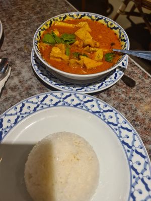 Yellow curry with tofu. Cashews. I had to send back for no onion and it returned like this without the other veggies (tomatoes..?) at Rice Bowl in Oslo