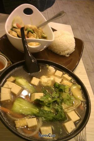 Tofu veggie noodle soup, and veggie curry with rice. at Taste of Saigon in Calgary