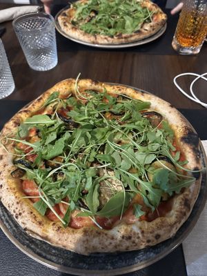 Pizza with vegan cheese   at Eteria in Posada