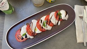 caprese di mozarella vegan  at Eteria in Posada
