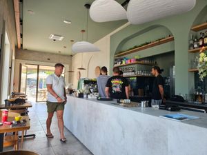 The new team and management receiving barista training at Java Coffee in Radovici