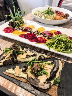 Brunch for champions! Fungi pizza and Mexican bowl! at Nama Artisan Raw Foods in West London