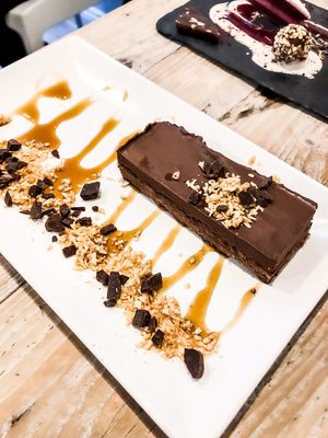 Have your cake and eat it too! Salted caramel chocolate cake!! at Nama Artisan Raw Foods in West London