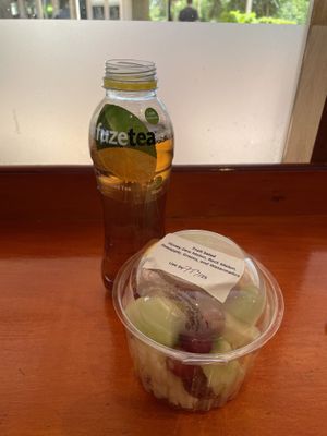 Fruit salad and lemon iced teaa  at Kulata Academy Cafe in Yulara