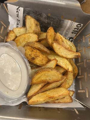 Potato wedges with vegan mayo  at m'EAT ME Gastro Bar in Sarajevo