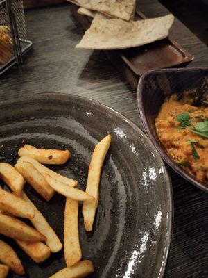Masala chips and dish at Nu Delhi Restaurant Lounge in Belfast
