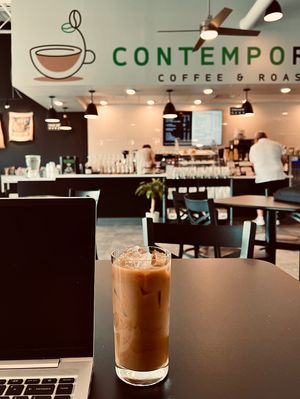 Iced cold brew latte with my new favorite, macadamia milk 😍 at Contemporoast  at ContempoRoast Coffee & Roastery in Centerville