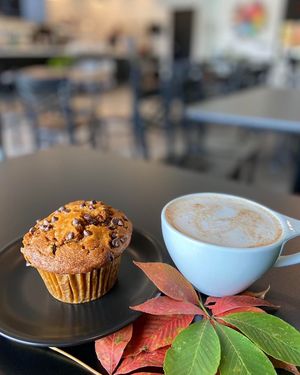 Chubby Bunny pumpkin chocolate chip muffin with a pumpkin chai with almond milk (chai contains honey) at ContempoRoast Coffee & Roastery in Centerville