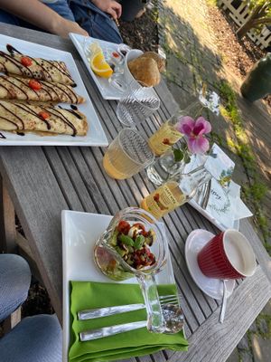 Savory meals: Brotzeit, savory pancakes with cream cheese and tomatoes, avocado, feta and tomato salad  at Jennys Æblehaven in Nexo