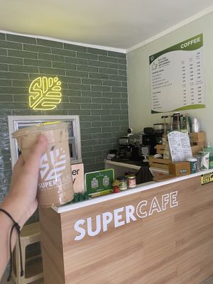 cute instagrammable interior with vegan spanish latte  at SuperCafe PH  in Quezon City