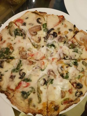 gluten-free tahini pizza at Carrots - Cloud Kitchen in Bangalore