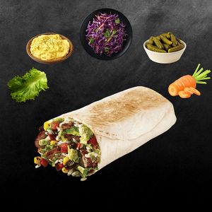 Egg Mayo Wrap! featuring crisp purple cabbage, zesty gherkins, fresh carrot, and our creamy, dreamy egg mayo.  at Toss It in Phnom Penh