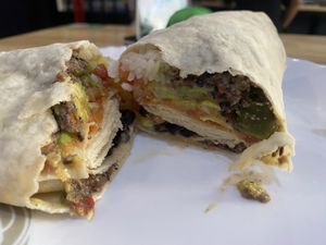 Vegan burrito with extra cashew sauce and chilly  at Toss It in Phnom Penh