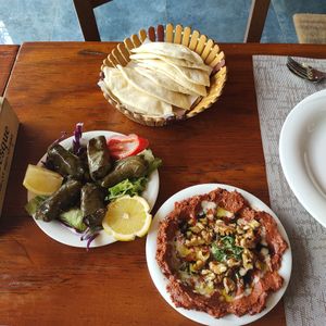 Jalenxhi (stuffed vine leaves) and muhamara at Restorant Arabesque in Tirana