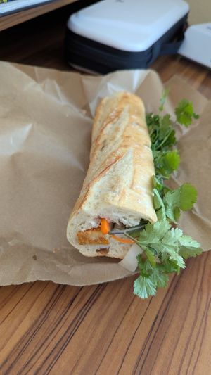 Tofu Banh Mi- marinated ginger lime tofu, pickled carrot & daikon, cilantro, basil, cilantro/lime leaf mayo (vegan) on baguette.  at Feast! Food in Charlottesville