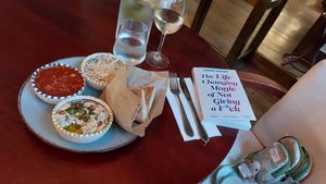 Hummus.  Tomatoes with herbs. Cabbage with sesame.  Pitta breads at Jerusalem By PRAGUE in Prague