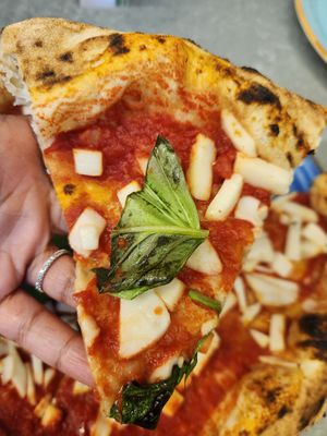 Vegan margherita pizza (vegan rice mozzarella cheese, basil, tomato sauce, oil) at Fresco & Cimmino in Milan