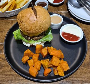 Teriaky burger with baked sweet potatoe at VEGANERIE Street - วงเวียนใหญ่ in Bangkok