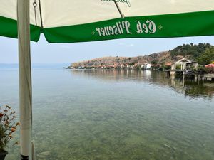 View of Lake Ohrid from the outdoor seating area.  at Restorant Leza in Lin